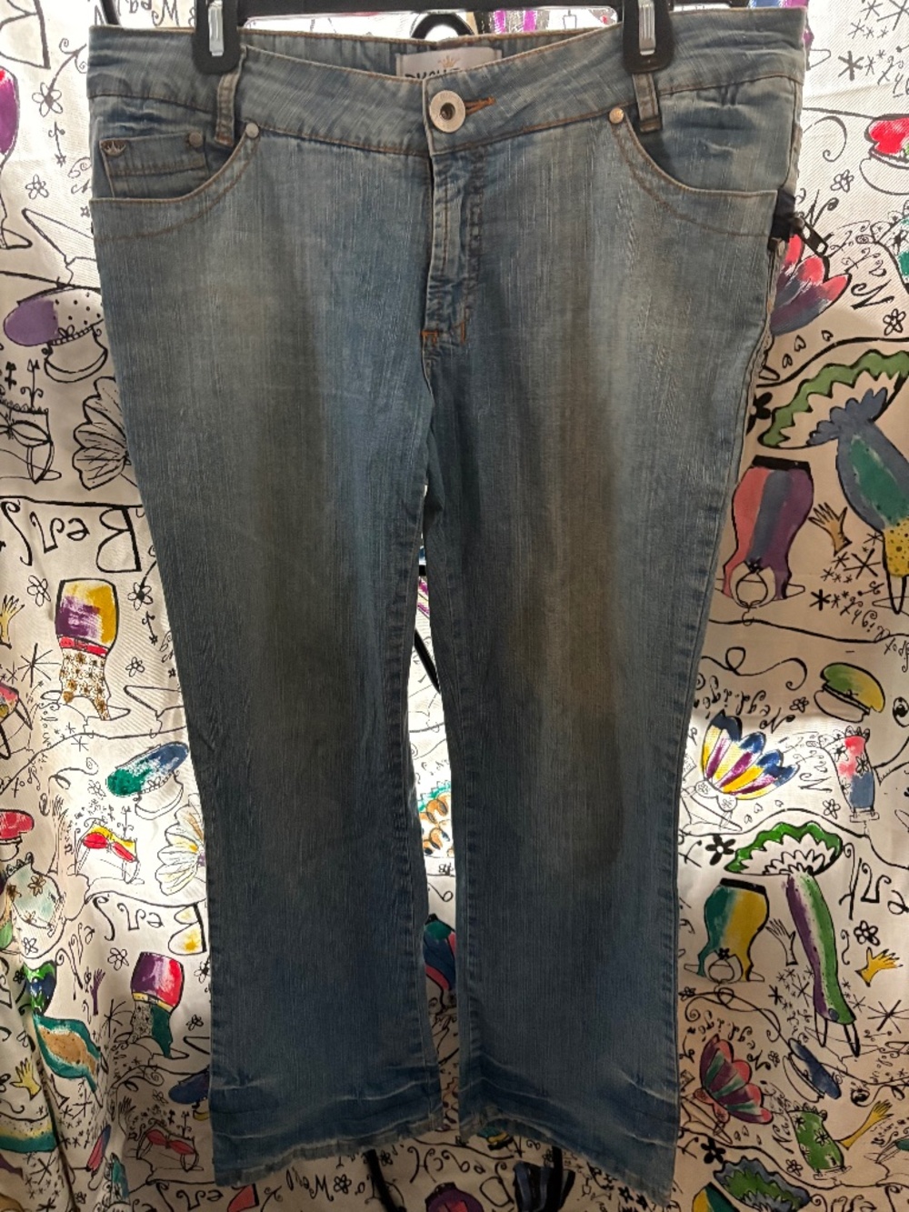 Retro light wash low rise denim with slight boot cut